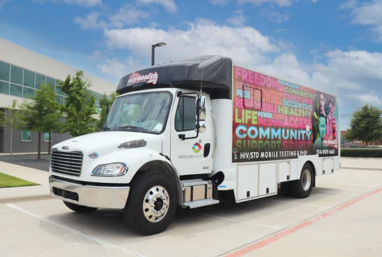 The SexyHealth Moble Unit parked in front of Resource Center